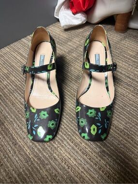 Prada Black Floral Mary Jane Heels with Green Accents